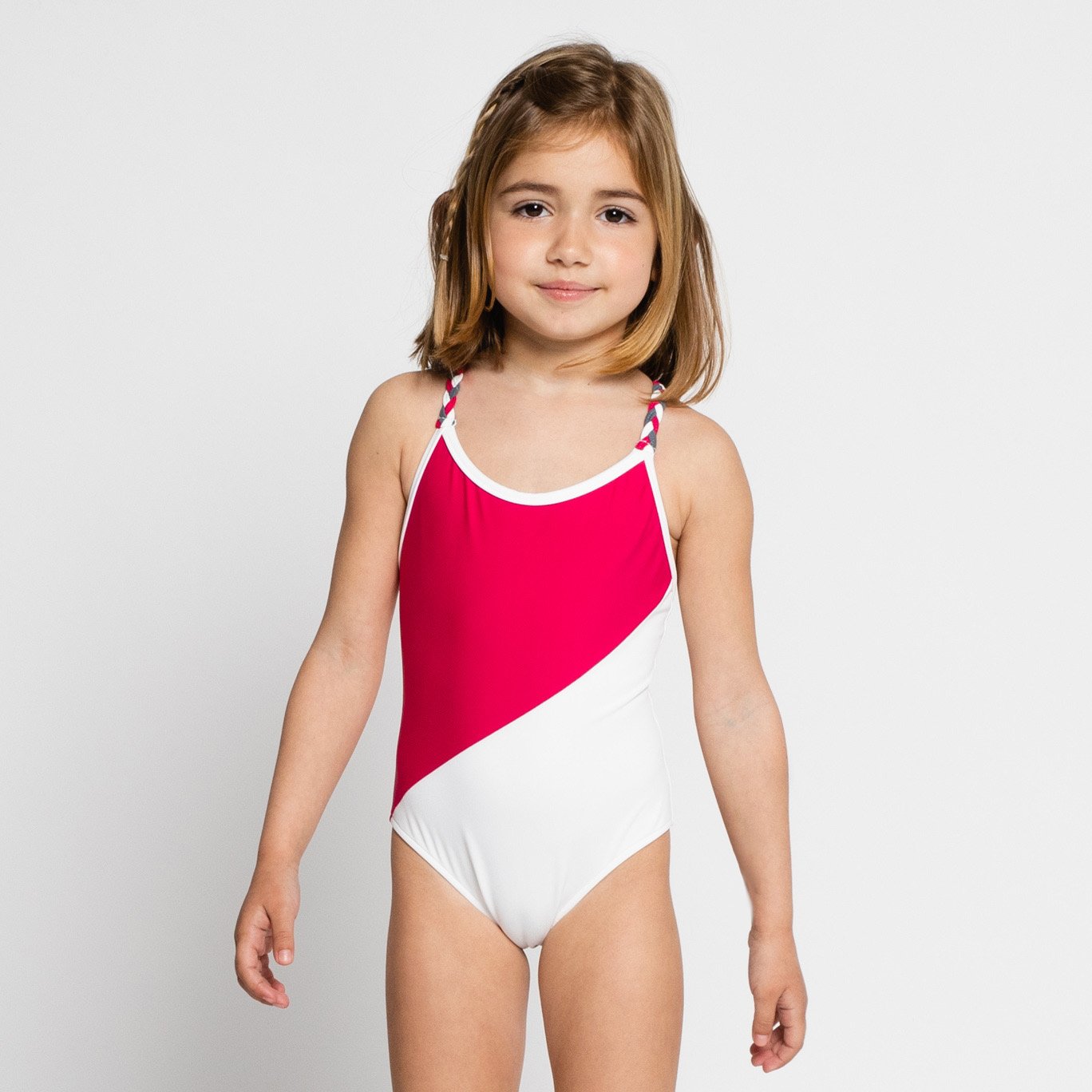 Bañador niña fucsia y blanco sostenible