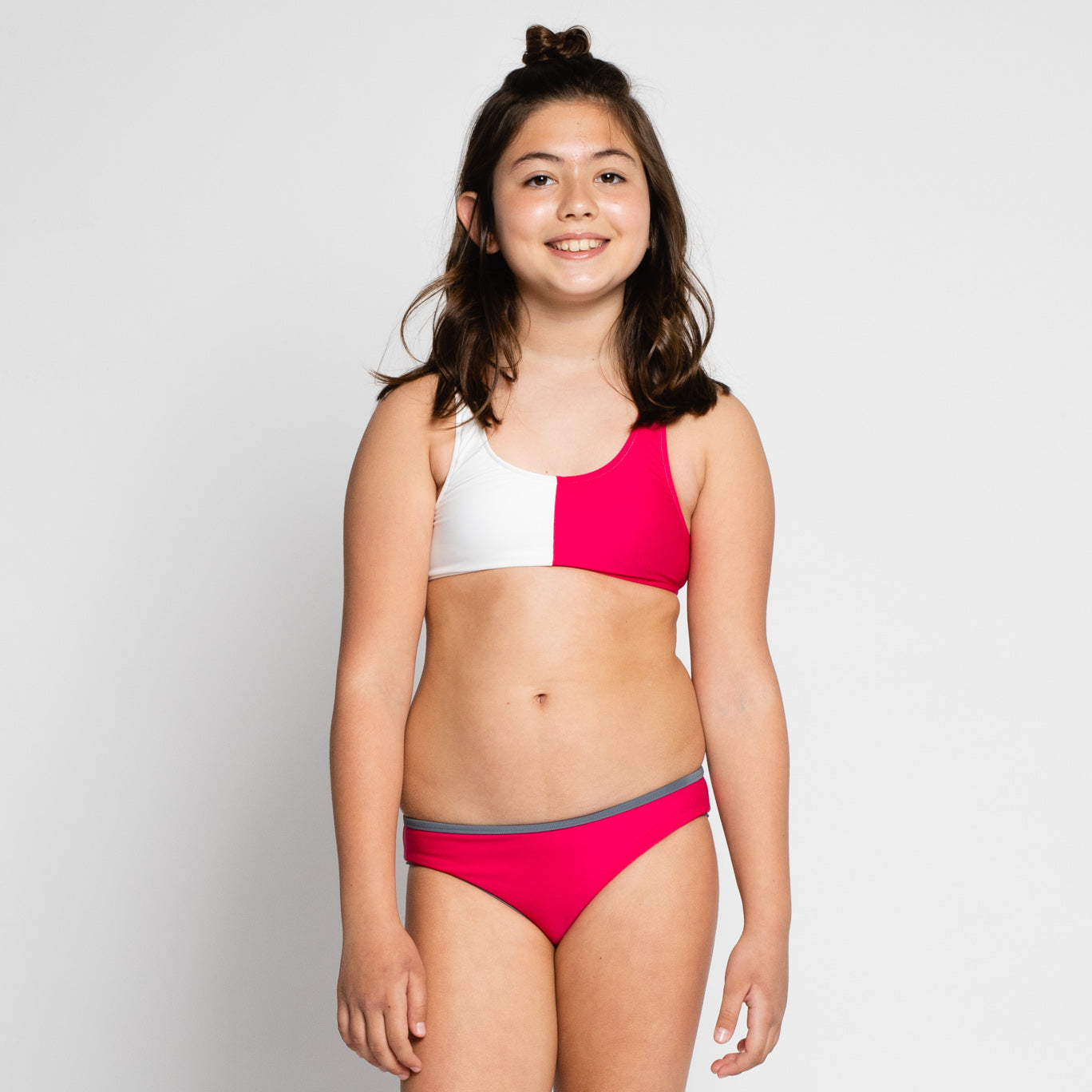 bikini de niña fucsia sostenible
